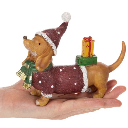 Dekofigur Dackel mit Geschenkpaket und Mütze aus Polyresin 18 cm x 5 cm x 13 cm | Floristik21.de