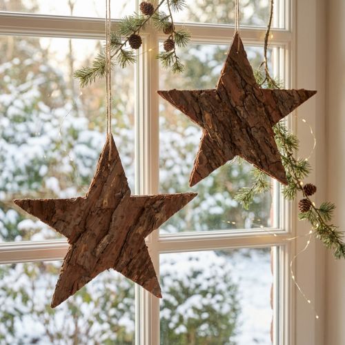 Artikel Natürliche Piniensterne zum Hängen, 3er-Set, Ø 20cm - Nachhaltige Weihnachtsdeko aus Holz