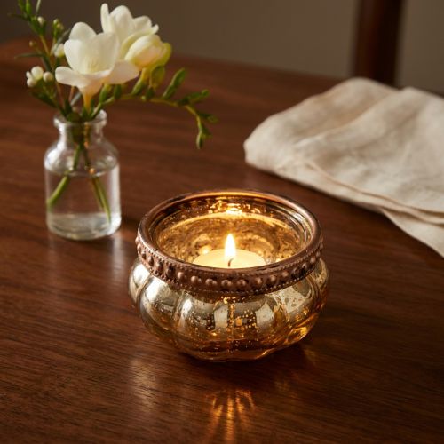 Artikel Teelichtglas Champagner Antik Gold mit Metallrand Ø6cm H3,5cm