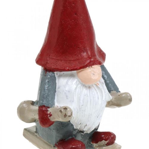 Floristik21 Motivkerze Weihnachtswichtel, Adventsdeko, Wichtel mit Skiern, Dekokerze H12cm